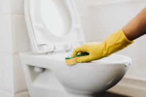 cleaning toilet